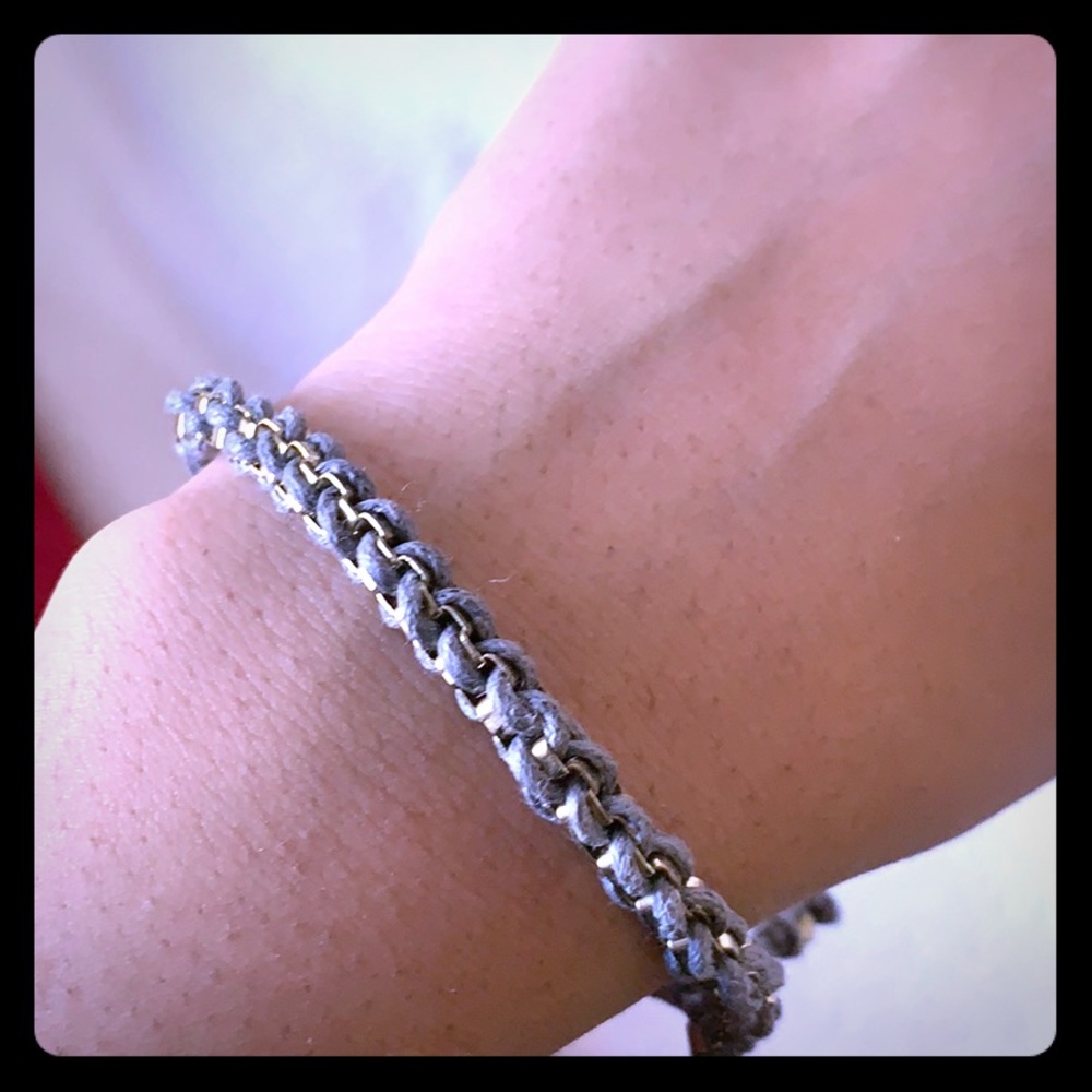 Silver bracelet with bronze chain details